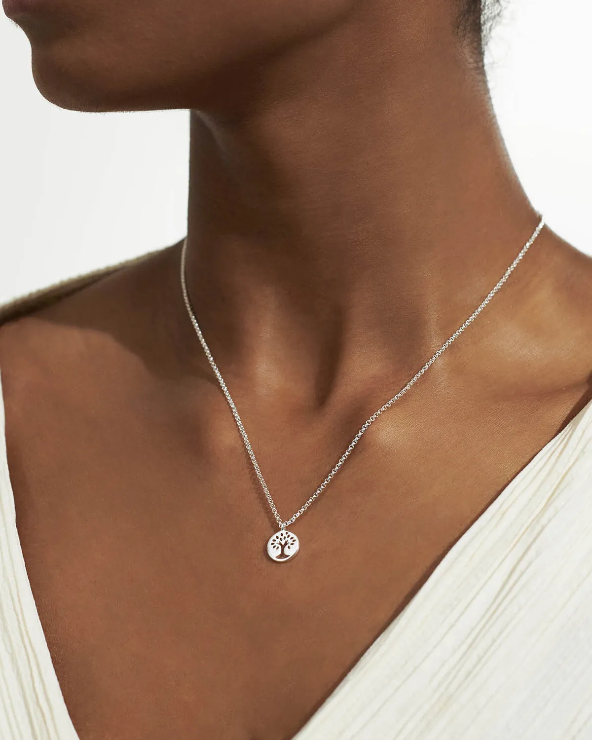 Joma Jewelry Un petit collier 'Famille' en argent