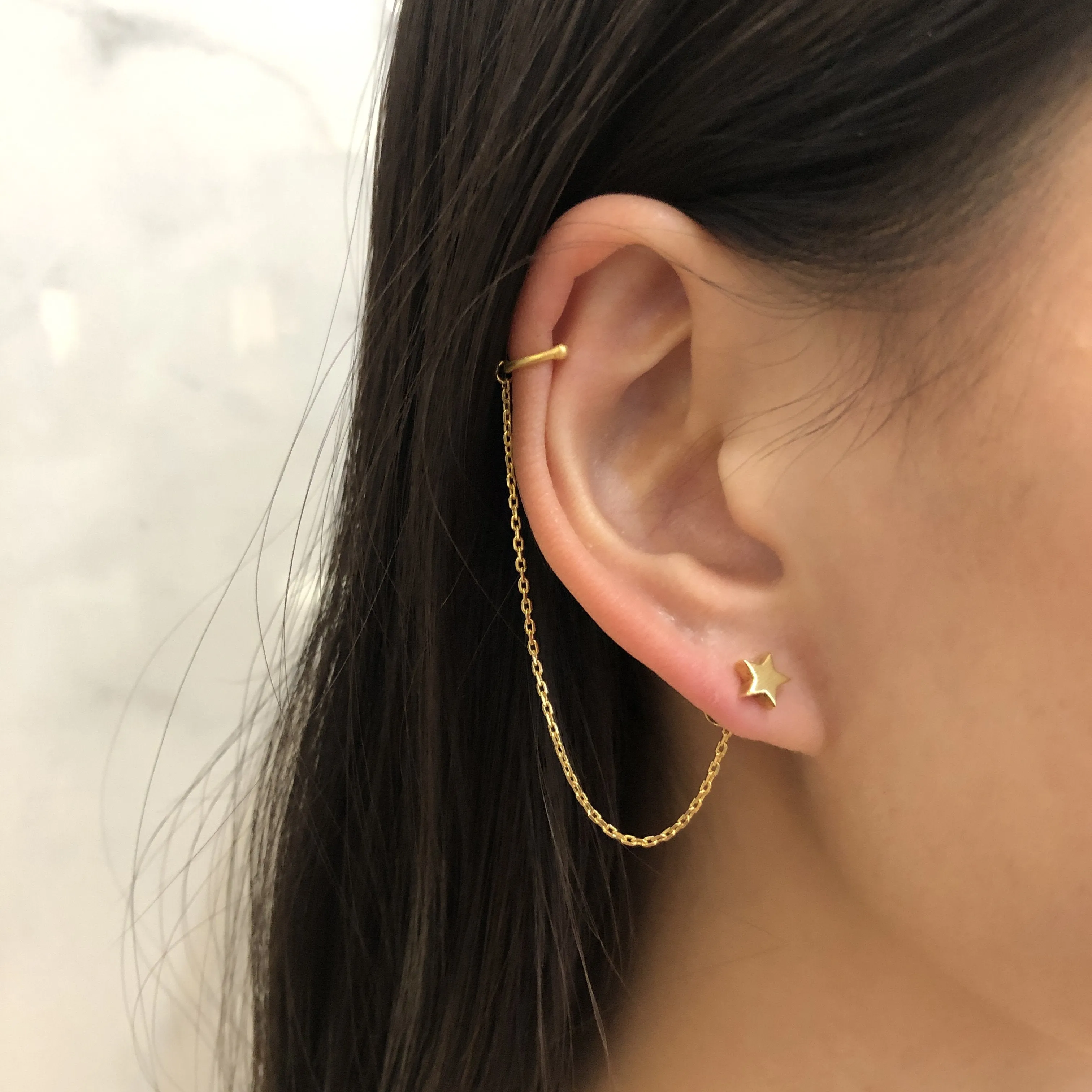 Boucle d'oreille étoile Maria Black, Or rose